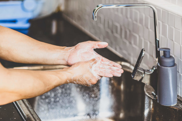 closeup up asian man hand washing with faucet wate 2021 09 03 23 02 47 utc